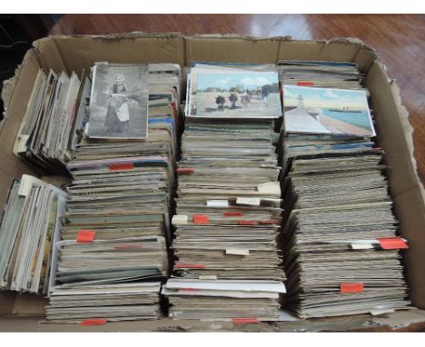 A large box of several hundred postcards, including Hold To Light, entertainers, docks, piers, pierretts, novelty etc 
