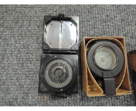 Two military compasses, a black GEC No 1B 142913 in card box and a black Mark 1 magnetic marching compass