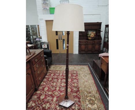 A 1920's mahogany standard lamp of Art Deco style
