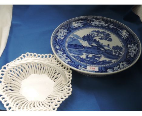 A late 19th century Wedgwood blue and white tazza in the Fallow Deer pattern and a Leeds style woven ceramic basket
