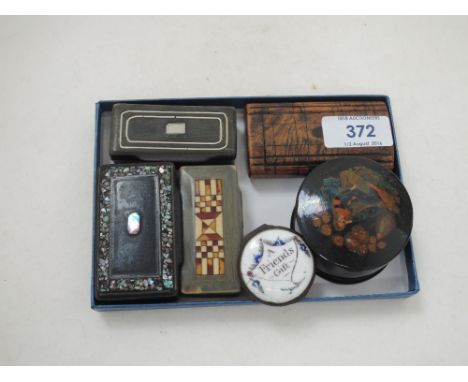Four treen and horn snuff boxes, a Bilston enamel patch box and a small lacquered trinket box