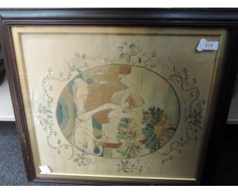 A silkwork panel of 18th century design in later frame