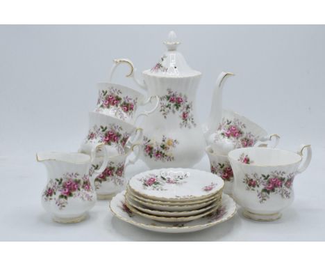 Royal Albert tea ware in the Lavendor Rose pattern to include a coffee pot, 5 small coffee cups, a tea cup, 4 small saucers, 