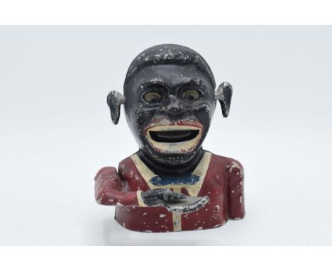 Vintage novelty metal money box in red jacket with mechanical arm, 15.5cm tall.  Quite light.