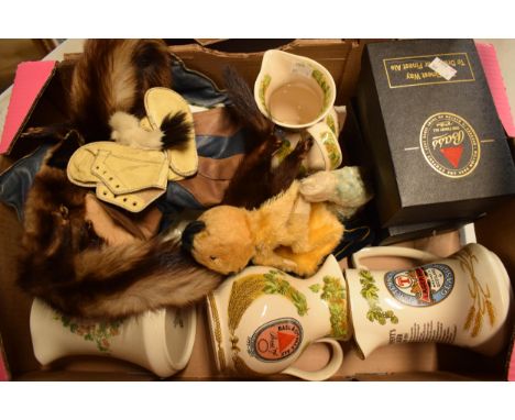 A collection of items to include Bass pub jugs, 1950s Sooty hand puppet, mink stoles and others.  