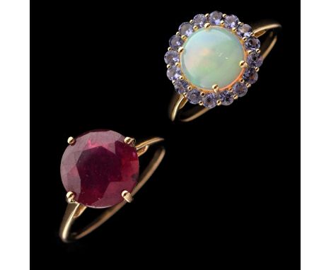 Opal and tanzanite 9ct gold dress ring, size S approx, and a synthetic ruby 9ct gold dress ring, size S approx, 6.4g gross ap