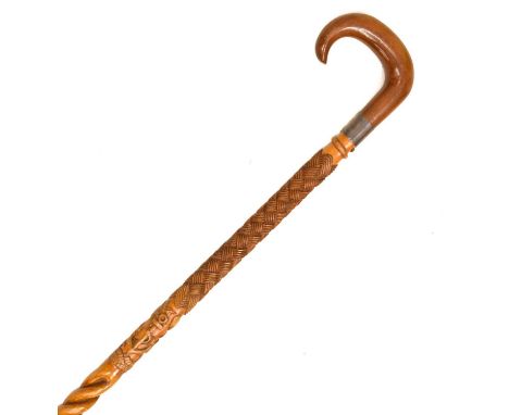 Early 20th century carved walking stick with white-metal mount, the beech shaft having central Masonic decoration depicting s