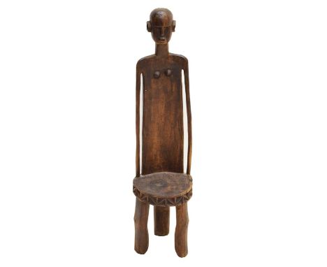 Ethnographica - Tanzanian carved figural low stool, 22.5cm (seat width) x 92cm high