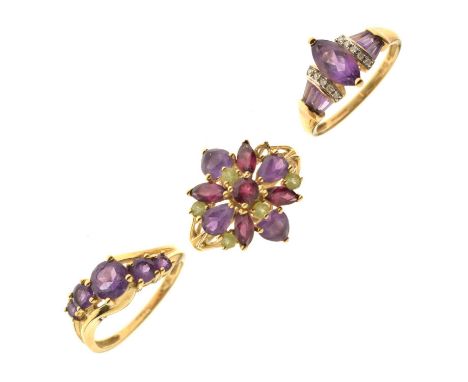 Three 9ct gold gem-set dress rings, each set amethyst-coloured stones, 9.6g gross approx (3)