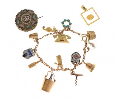 9ct gold belcher link bracelet attached various charms, 16.3 gross approx, together with a gold leaf-encased fob, and a base 
