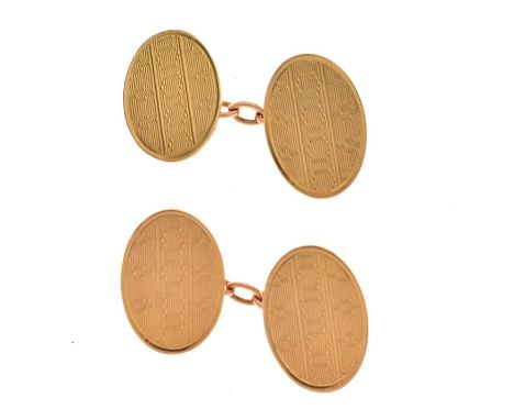 Pair of 9ct gold cufflinks, the oval panels having geometric engine turned engraved decoration, London 1929, 6.3g approx