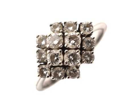 Diamond cluster ring, the fourteen brilliant cut diamonds claw set in a diamond shape, unmarked white metal, size R approx, 4