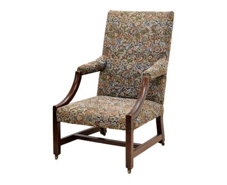 19th century mahogany open framed armchair of 'Gainsborough' type, with gently shaped open arms, raised on brass castors, uph