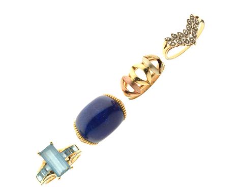 Four various 9ct gold dress rings, comprising a three-colour gold band, a wishbone-shaped ring, a lapis lazuli ring, and a bl