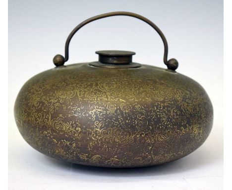 Chinese inlaid metal hot water bottle, of compressed spherical form, the screw-on cover and body both inlaid with floral and 