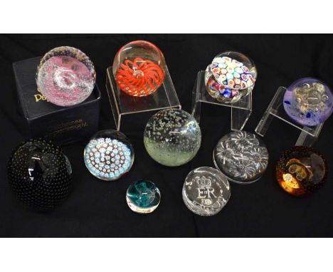 Collection of glass paperweights to include Caithness, Dartington, Selkirk, etc (11)