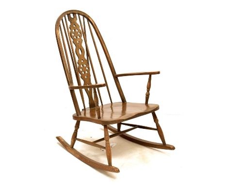 Attributed to Ercol - Quaker Windsor-style rocking armchair, 53cm (seats widest point) x 103cm high 