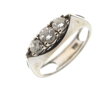 Modernist diamond three-stone 14ct white gold ring, the three brilliant cuts totalling 0.75ct approx (estimated), claw set be