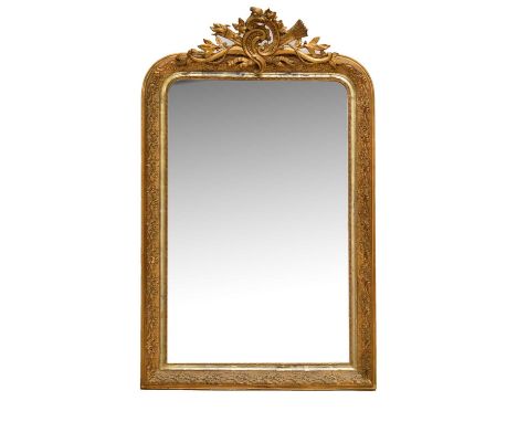 Late 19th century giltwood and gesso overmantel / console mirror, the arched mirror plate enclosed by floral and foliate scro