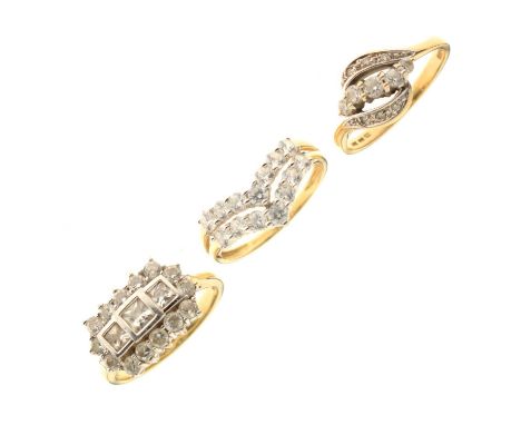 Three cubic zirconia dress rings, comprising two 14ct gold rings, and a 9ct gold cluster ring, 11.2g gross approx (3)