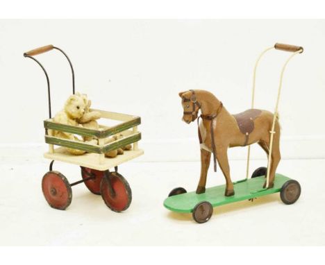 Three vintage teddy bears, including a golden mohair example, together with a push-along plush horse and tricycle cart, 50cm 