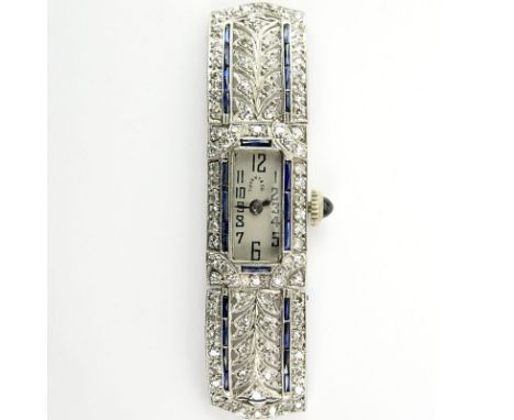 Circa 1920s Lady's Tiffany & Co Art Deco Single Cut Diamond, Platinum Filigree and Sapphire Watch with Manual Movement. Signe