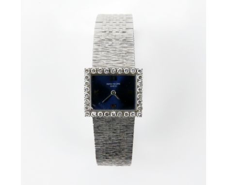 Lady's Circa 1960 Patek Philippe Genève 18 Karat White Gold and Diamond 20 Jewel Bracelet Watch Ref. 3363/2 Manual Movement w