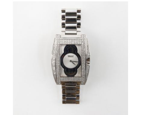Man's Chopard 18 Karat White Gold and Pave Set Round Cut Diamond Bracelet Watch. Case stamped 18K, numbered 579538 4500 1. Ca