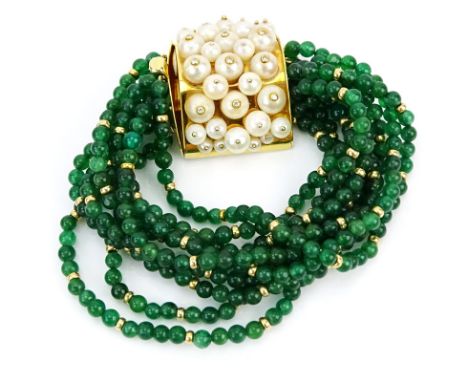 Circa 1950s Ten (10) Strand Emerald Bead, Pearl and 18 Karat Yellow Gold Bangle Bracelet. Emeralds with vivid green color. Si