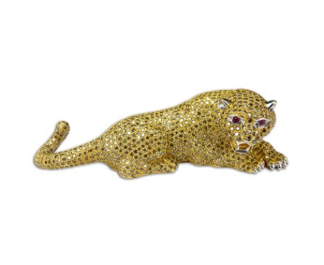 Approx. 38.50 Carat Natural Color Diamond and 18 Karat Yellow Gold Panther Objet D'Art set with Ruby Eyes. Stamped 18K. Very 