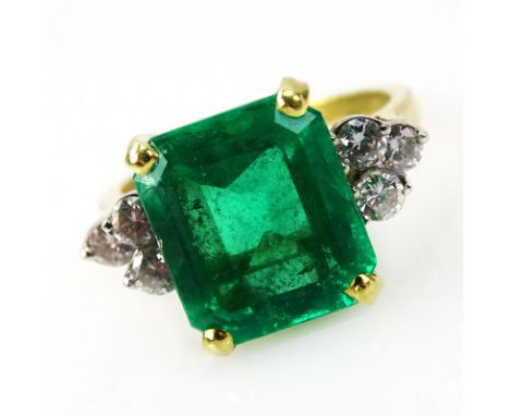 Lady's Vintage Approx. 6.66 to 6.95 Carat Rectangular Step Cut Emerald, .60 Carat Round Brilliant Cut Diamond and 18 Karat Ye