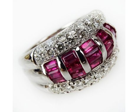 Approx. 2.10 Carat Invisible Set Ruby, 1.30 Carat Pave set Diamond and Platinum Ring. Rubies with vivid saturation of color. 