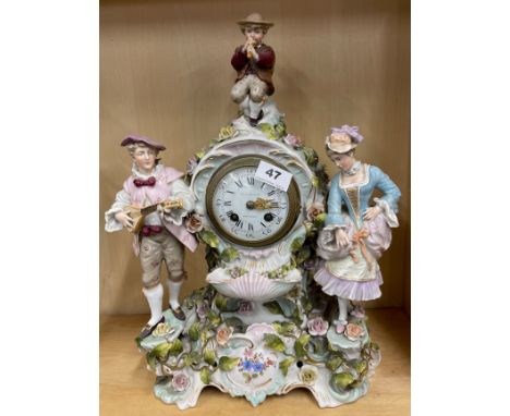 A 19th C French porcelain mantel clock case with notation on dial for 'George. E. Butcher, Nottingham', H. 44cm.