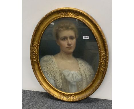 An oval gilt framed 19th Century pastel portrait of a young woman, frame size 58 x 69cm.