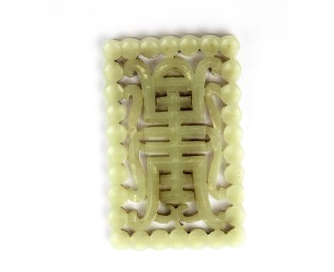 A Chinese carved mutton fat jade double sided character amulet, 8.5 x 5.5 x 0.4cm.