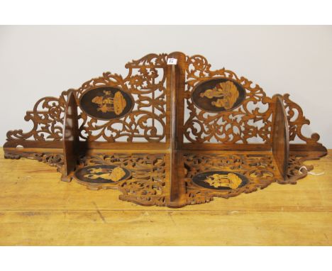 A lovely 19th Century fretworked and inlaid olive wood corner bracket, H. 84cm.