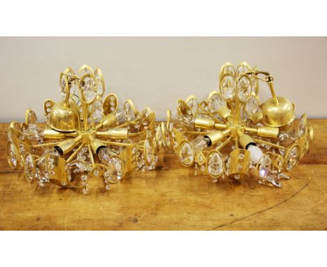 A pair of 1970's gilt brass and crystal ceiling light fittings.