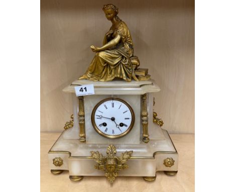 A 19th C French ormolu mounted mantel clock with striking movement, H. 38cm. Appears to be in working order.