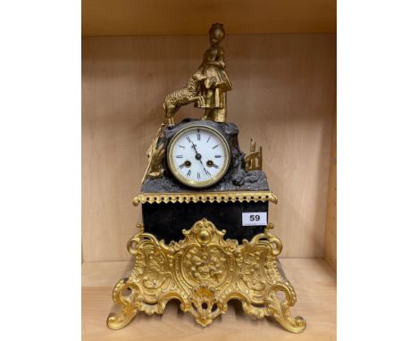 A 19th C French gilt brass mounted figure on mantel clock, H. 47cm.