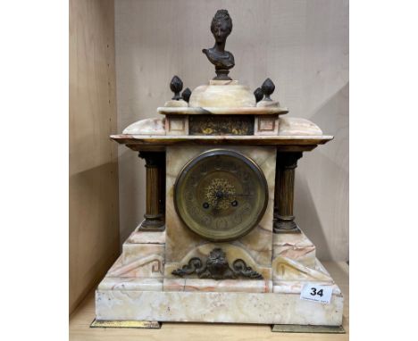 A 19th C French marble and gilt brass mantel clock with striking movement, H. 42cm. No pendulum.