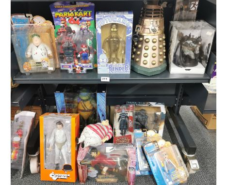 Cinematic and gaming interest: A large collection of cinematic items and game console related items, including figures from F