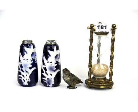 A pair of continental hallmarked silver rimmed porcelain vases, a Chinese brass egg timer and a cold painted spelter bird, eg