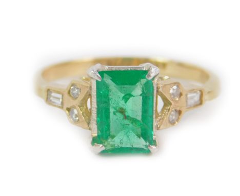 An 18ct gold platinum emerald and diamond set ring, approx 0.8ct, size M, 2.4g.