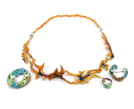 Silver and plique-a-jour enamel jewellery designed by Dorothy Budd, comprising an abstract necklace with amber links, and ova