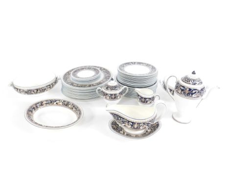 A Wedgwood porcelain part dinner and coffee service, decorated in the Florentine pattern, W1956, comprising pair of vegetable