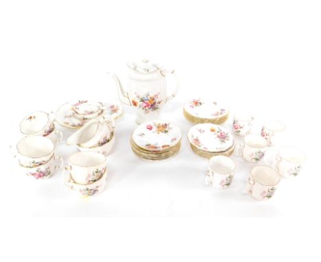 A Royal Crown Derby porcelain part tea and coffee service decorated in the Derby Posies pattern, including a coffee pot, crea