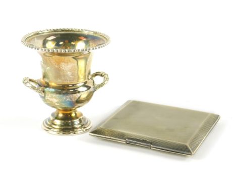 A George V silver cigarette case with engine turned decoration, London 1932, and a silver campana vase, Birmingham 1971, 6.97