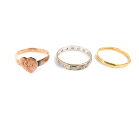An 18ct gold octagonal wedding band, size P, 2.0g, together with a Victorian 9ct gold lady's signet ring, heart shaped with e