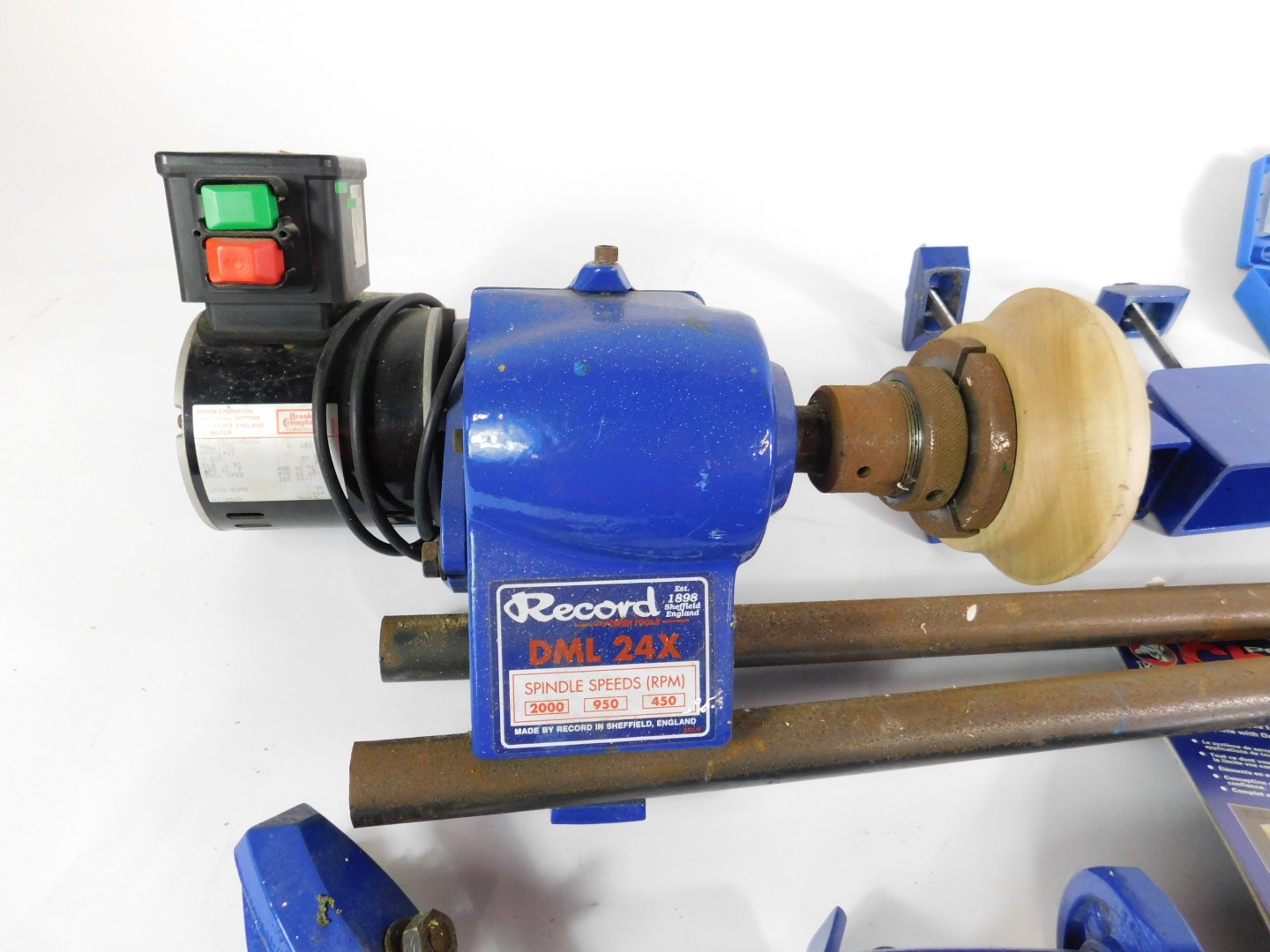 A Record wood turning lathe, DML24X, together with clamps, and a power