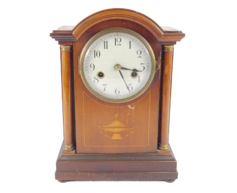 An Edwardian mahogany and inlaid mantel clock,  enamel dial bearing Arabic numerals, eight day American movement with coil st